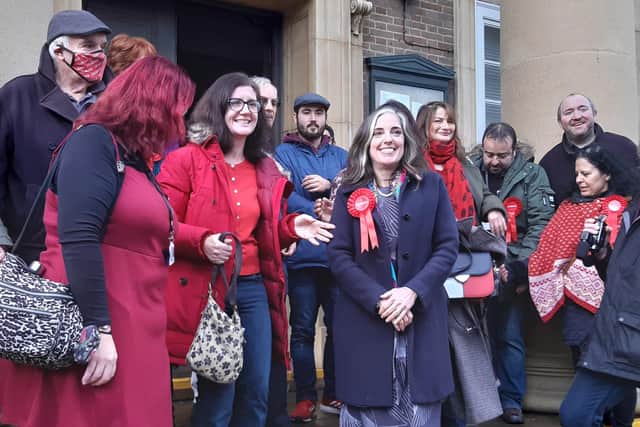 Vicki Wells surrounded by Labour supporters after her by-election win