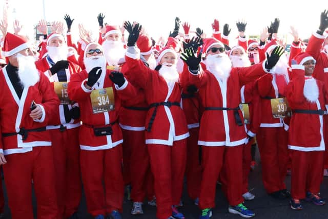 A group of Santa's from the 2019 run.