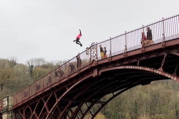 James Williams-Fuller from Cuckfield said he performed a backflip off of the world's first iron bridge in Shropshire after extensive safety checks.