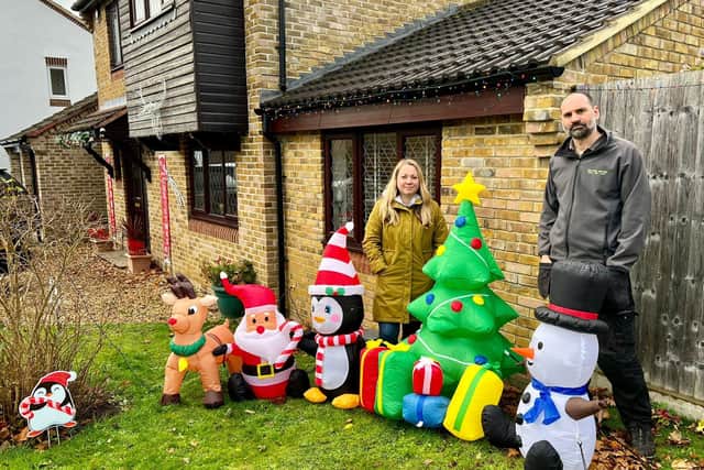 Caroline and Sam Paul with some of their garden Christmas decorations