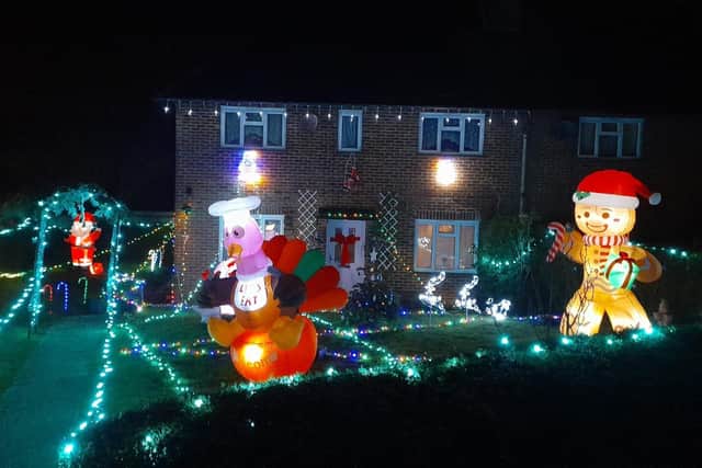 Balcombe mum Heidi Gilbert has put up a colourful Christmas lights display in her front garden to help raise money for Balcombe Primary School’s PTA.