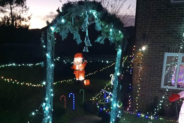 Balcombe mum Heidi Gilbert has put up a colourful Christmas lights display in her front garden to help raise money for Balcombe Primary School’s PTA.