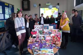 Travel and Tourism teachers and students collected toys for the More Radio Toy Appeal.