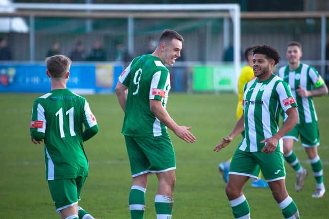 Chichester City celebrate one of the goals that beat Ashford United 3-2 at Oaklands Park / Picture: Neil Holmes