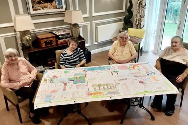 Horsham care home and primary school join together to make collage for The Big Draw Festival.