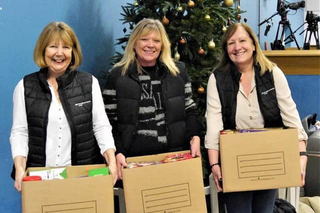 A partnership of local organisations collected items to make up more than 260 Christmas Food Hampers. Picture: Burgess Hill Town Council.
