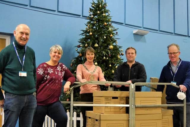 A partnership of local organisations collected items to make up more than 260 Christmas Food Hampers. Picture: Burgess Hill Town Council.
