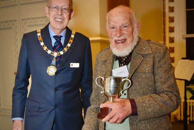 John Munro was presented with the Arundel Community Cup  by Arundel mayor Tony Hunt to mark his contribution to life in the town as a long-standing resident