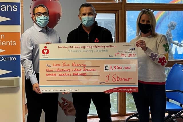 James Stoner, awards vice-chairman, and Nicky Dumbleton, awards treasurer, present the cheque to John Price, corporate and community fundraiser for Love Your Hospital
