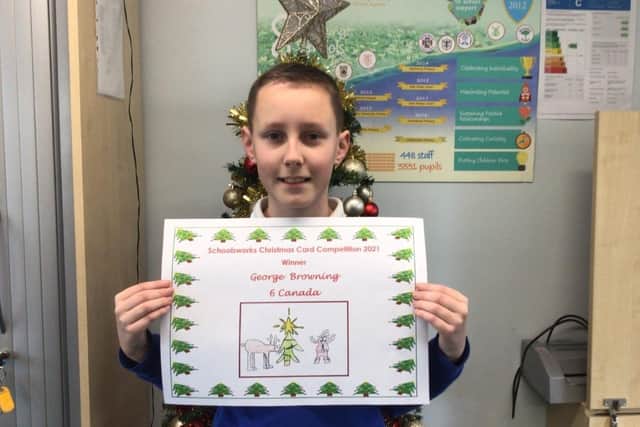 George Browning with his winning Christmas card design