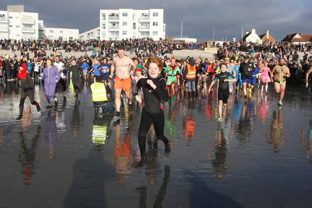 Turning back the clock: 1st Birdham & Witterings Scout Group New Year's Day Dip 2019. Photo by Derek Martin Photography. SUS-190101-204116008