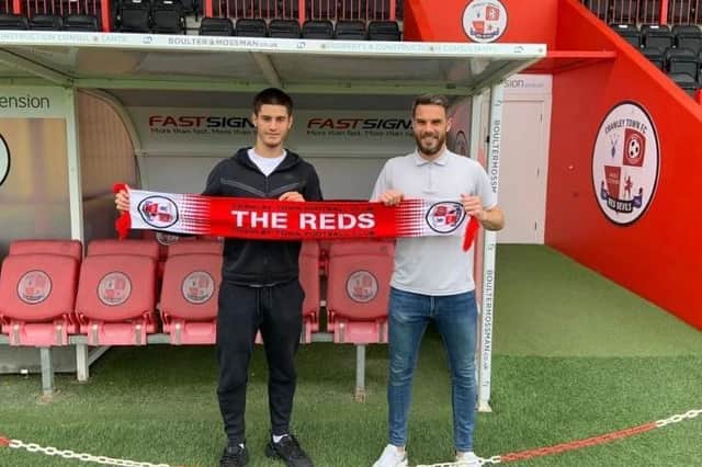 Florian Kastrati (left) with Glenn Morris. Picture courtesy of Crawley Town FC