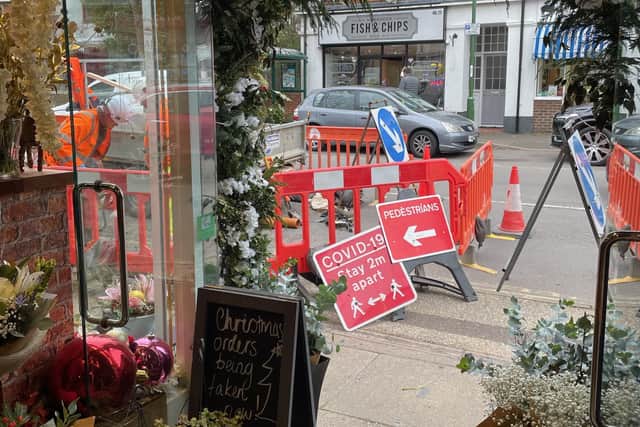 Kelly Harding, the owner of Bella June Flowers in Keymer Road, Hassocks, is angry that roadworks are taking place outside of her shop in the run-up to Christmas. Picture: Kelly Harding.