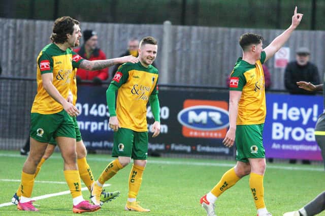 Horsham celebrate Tom Richards' (centre) opener in the win against East Thurrock United. Picture by Derek Martin Photography and Art