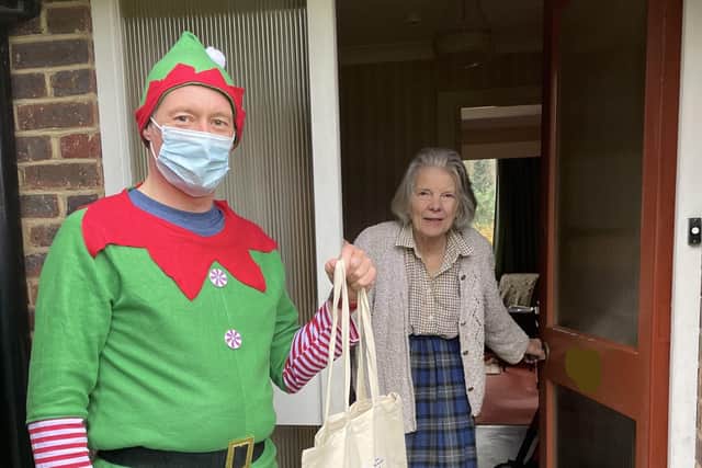 Local Age UK and OneFamily’s elf army make special delivery. Winter warmth Bags of Support distributed to vulnerable older people this Christmas.