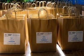 Food bags are being put together for Brighton families in need