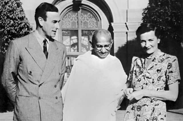 Lord Louis Mountbatten (L) and Lady Edwina Mountbatten (R) receive Mahatma Gandhi, when Lord Mountbatten becomes Viceroy of the British Indian Empire on April 11, 1947. Lord Mountbatten is the last Viceroy of the British Indian Empire (1947) and the first Governor-General of independent India (1947–1948).  (Photo credit AFP/GettyImages)