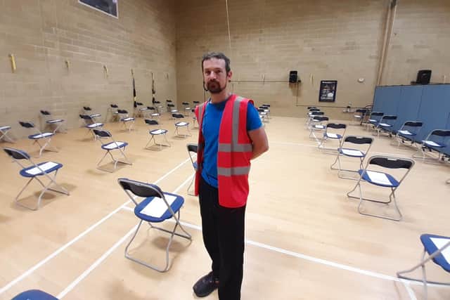 Dr Matt Greenwood inside the vaccination centre at Christ's Hospital in Horsham. Picture: Lawrence Smith.
