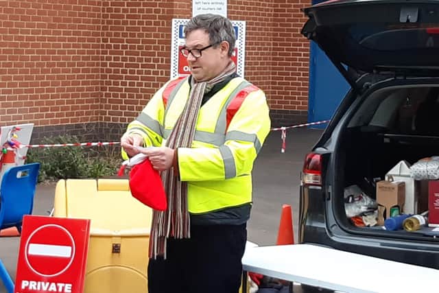 Horsham MP Jeremy Quin calls out the raffle winners. Picture: Lawrence Smith.