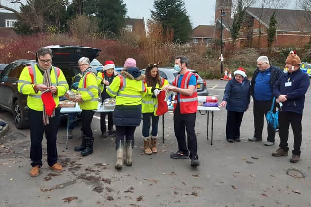 Horsham MP Jeremy Quin (left) and Dr Matt Greenwood call out the raffle winners. Picture: Lawrence Smith.
