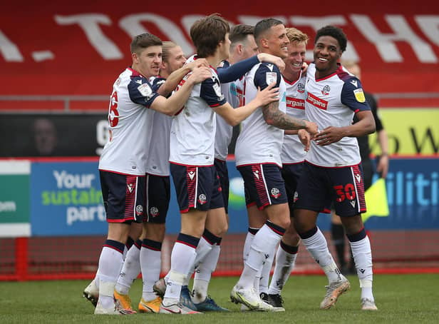 Bolton gained promotion at Crawley Town last season