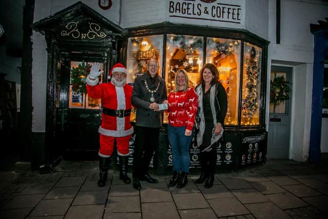 The presentation of the prize at Bagels and Coffee