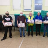 Alison Whitburn, community champion at Morrisons Littlehampton, left, with, from left, Roy Wood, chair of trustees of Littlehampton Foodbank, Rotarians Keith Green, Bruce Green and Geoff Watts, and Nicky Thompson from Littlehampton Foodbank