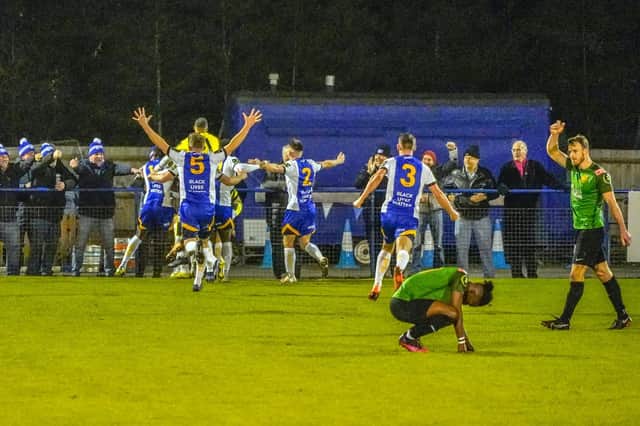 Haywards Heath Town celebrate their 97th minute winner against Sevenoaks Town. Pictures by Ray Turner