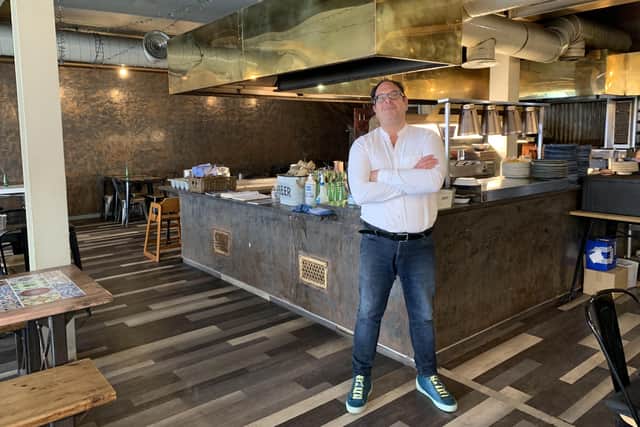 Andy Sparsis, owner of The Fat Greek Taverna in Worthing, challenged the Employment Minister and local MP for Worthing to work a shift in his restaurant