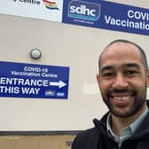 Josh Babarinde outside the vaccine centre in Sovereign Harbour SUS-211222-161614001