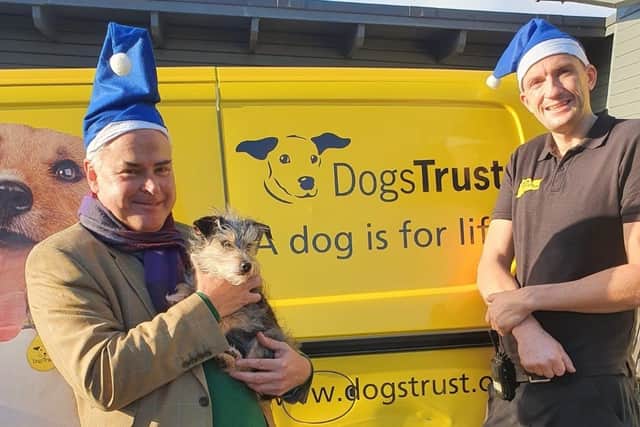 Tim Loughton MP with Poppy and Dogs Trust Shoreham Rehoming Centre maintenance operative Ryan Hawkins