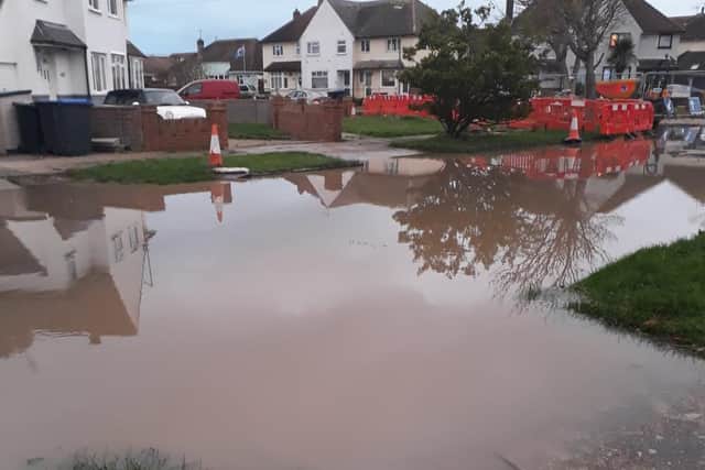 Heavy sewage flooded onto pavements and driveways in West Beach, Lancing on Wednesday afternoon. Photo: Adrienne Lowe