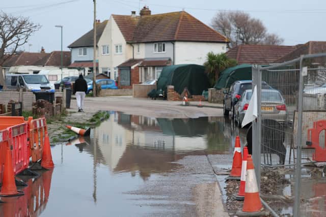 Repair work on a burst main in West Way is ongoing after a leak on Wednesday (December 22) — the fourth in three months on the same residential estate  Photo: Eddie Mitchell