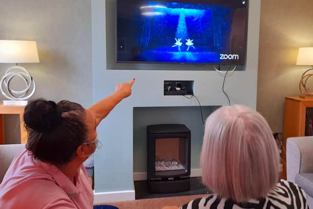 A resident at Westergate House Care Home who worked as a ballerina enjoying the Nutcracker SUS-211229-144809001