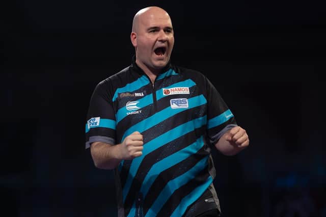 Rob Cross on the way to beating Daryl Gurney / Picture: Lawrence Lustig - PDC