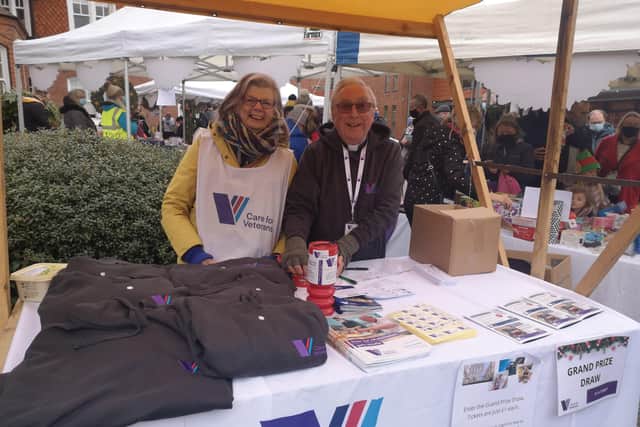 Beverley and the Rev George Butler volunteering at the Christmas market in the grounds of Care for Veterans' hospital home in Worthing