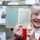 Mary Taylor at Rustington Museum in 2011, holding the 1944 diary of Edgar Sopp, part of a Rustington at War exhibition. Picture: Gerald Thompson L24142H11