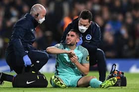 Brighton striker Neal Maupay needed treatment to a facial injury after tangling with Lukaku