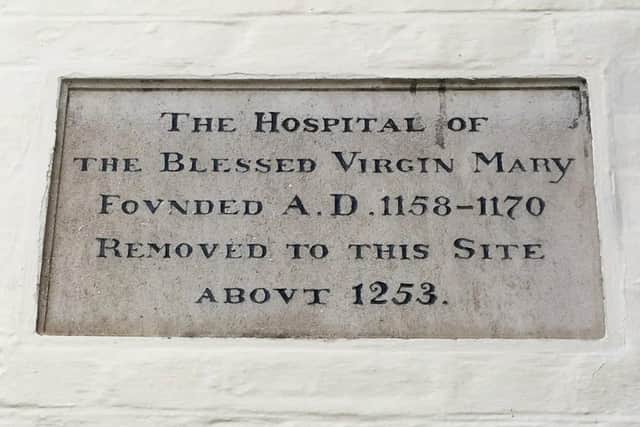 The plaque above the entrance to St Mary’s Hospital in Chichester