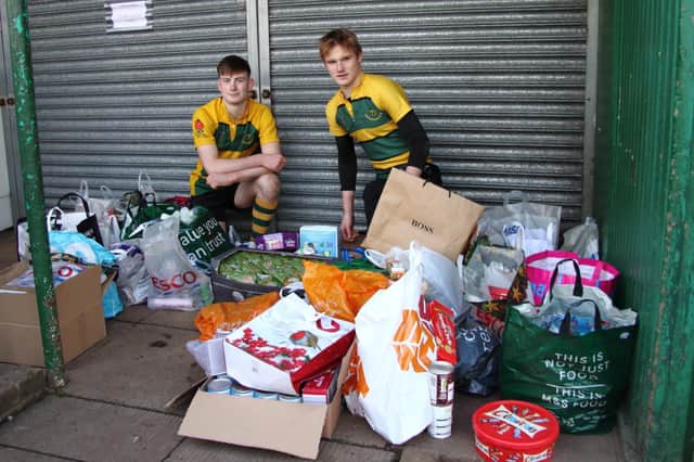 Shoreham RFC youngsters with stock collected for the food bank