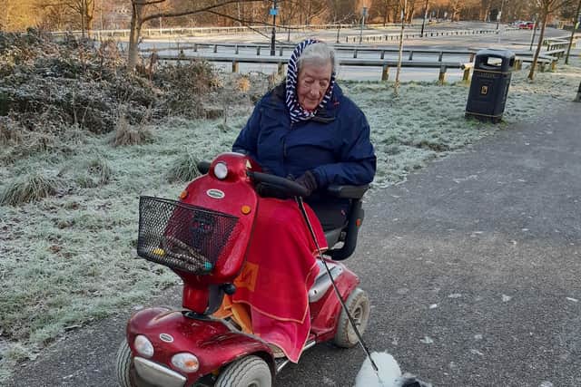 Long-standing Tilgate resident Betty Oldfield goes for a walk around the park twice a day with her dog