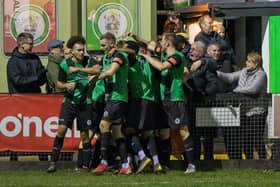 Burgess Hill Town celebrate their dramatic late winner against promotion-chasing Cray Valley PM. Picture by Chris Neal