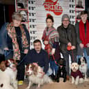 Photo was taken at 2018's Dress Up Your Dog Day at The True Crime Museum in Hastings.Curator Joel Griggs (centre) with a few of the visitors. SUS-220901-104830001
