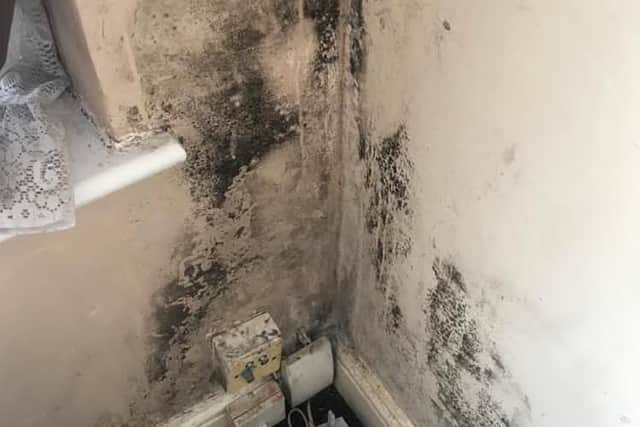 Adrian Ovenden, his partner and their three children are living in a flat covered in mould and damp in Lancing