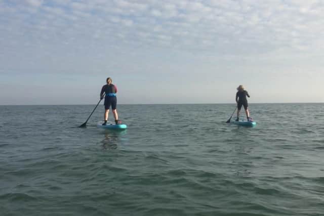 SUP newbies during a paddling class in Hove