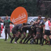 Worthing Raiders and Bury do battle in the mud / Picture: Colin Coulson