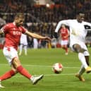 Nottingham Forest debutant Steve Cook clears the ball whilst under pressure from Arsenal's Eddie Nketiah during Sunday's FA Cup third round match at the City Ground. Picture by Michael Regan/Getty Images