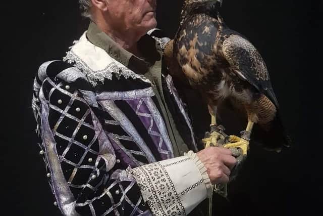 Julian Ford, founder of Huxley's Experience bird of prey centre, with one of his beloved birds