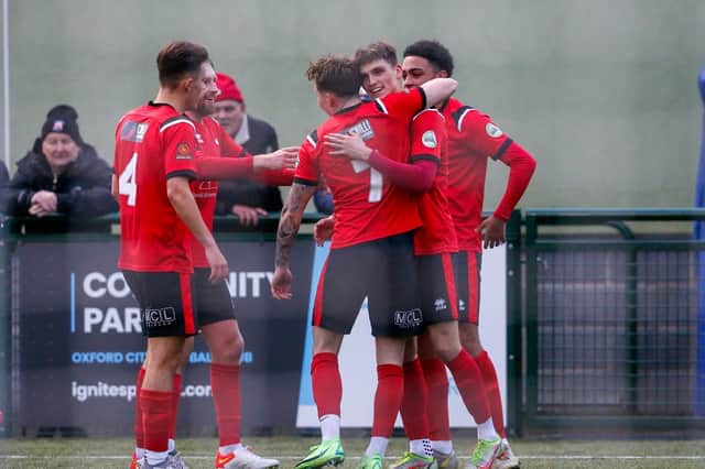 Eastbourne Borough players celebrate one of Charley Kendall's two goals that downed Oxford City / Picture: Lydia Redman