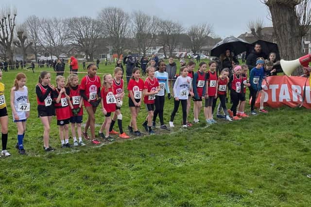 The HY Runners' under-11 girls on the start line